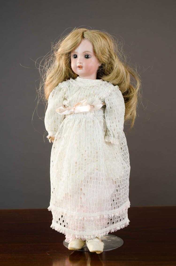 Appraisal: BEBE JUMEAU BISQUE SOCKET HEAD DOLL long blond wig pierced