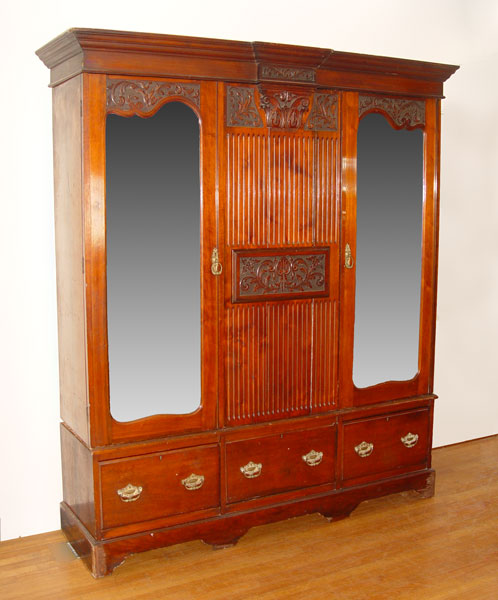 Appraisal: LARGE WALNUT WARDROBE Measures '' high x '' wide x