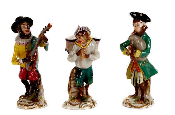 Appraisal: A German porcelain nine piece monkey band height of largest