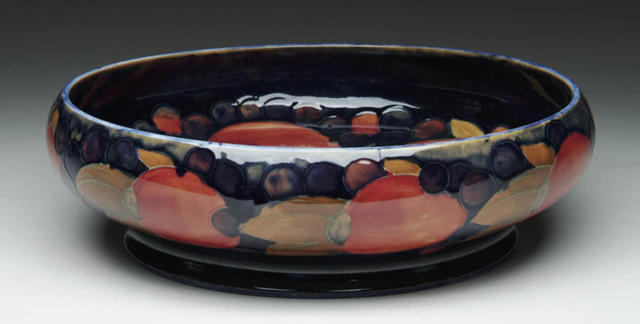 Appraisal: MOORCROFT CENTER BOWL Large Moorcroft center bowl is decorated inside