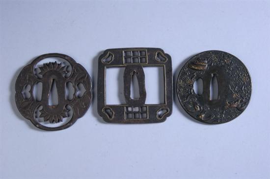 Appraisal: THREE JAPANESE IRON TSUBA SWORD GUARDS Edo period th -