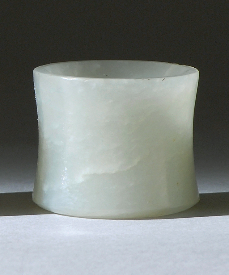 Appraisal: WHITE JADE SCHOLAR'S RING Early th CenturyIn waisted form From