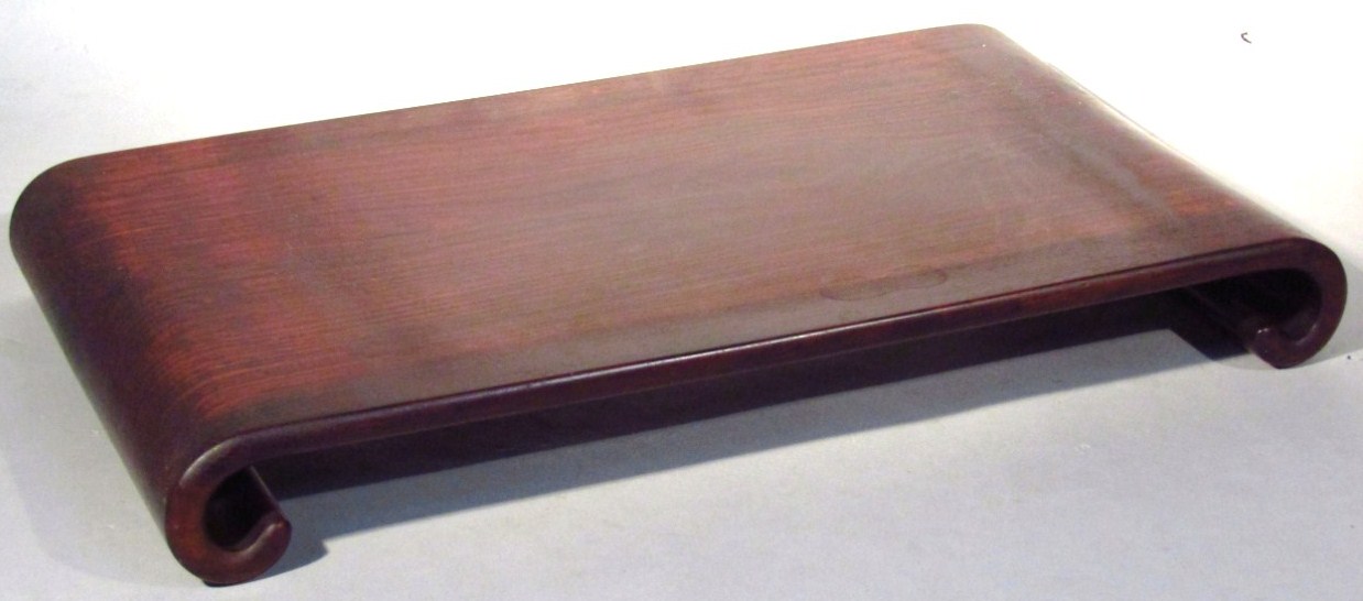 Appraisal: A thC Chinese hardwood headrest or stand of rectangular outline