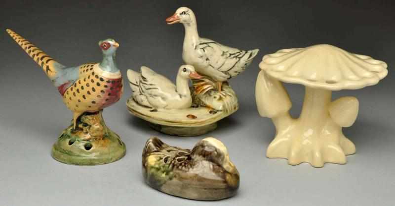 Appraisal: Lot of Flower Frogs Includes x Brush McCoy duck x