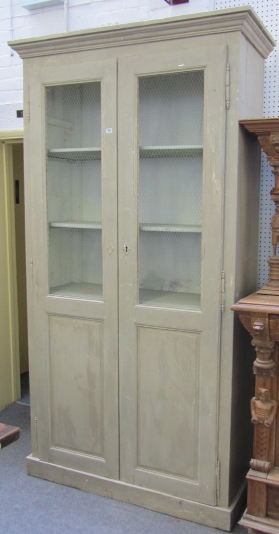 Appraisal: A th century French painted two door cupboard with chicken