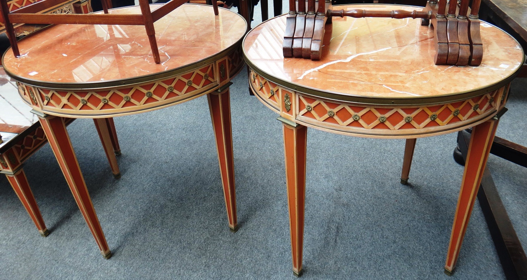 Appraisal: A pair of th century centre tables the circular brass