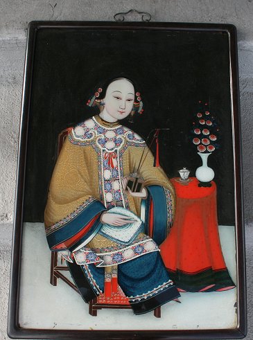 Appraisal: TH C ORIENTAL REVERSE PAINTING ON GLASS Depicts a young