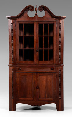 Appraisal: Federal style cherry corner cupboard single-case construction with broken-arch pediment