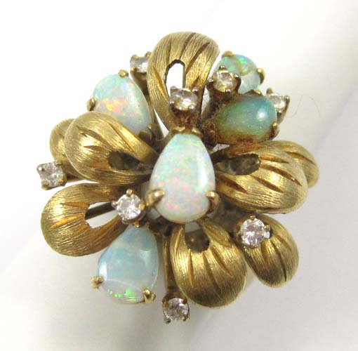 Appraisal: OPAL DIAMOND AND FOURTEEN KARAT GOLD RING set with five