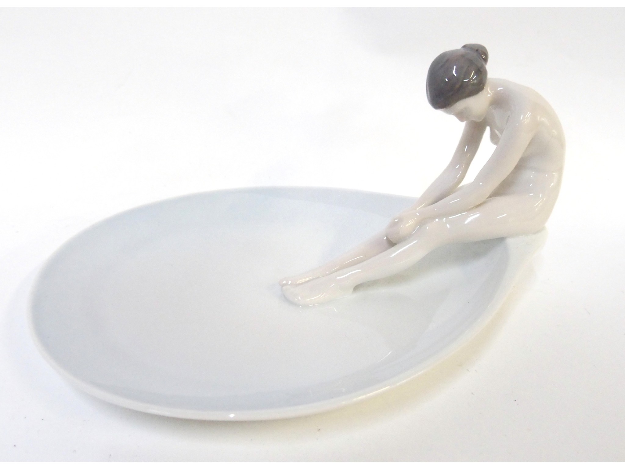 Appraisal: A Bing Grondhal porcelain dish surmounted with a nude female