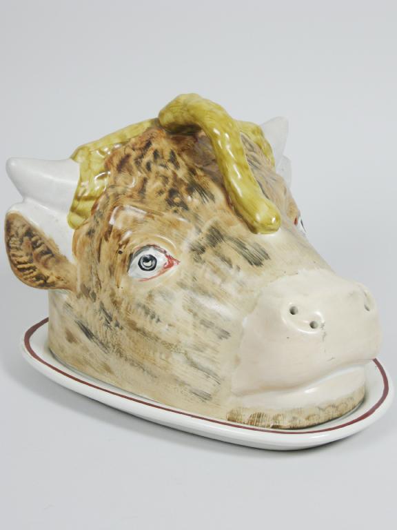 Appraisal: A Staffordshire bull's head Cheese Cover and Stand with painted