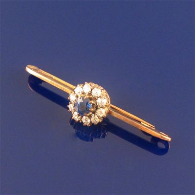 Appraisal: A sapphire and diamond cluster set bar brooch