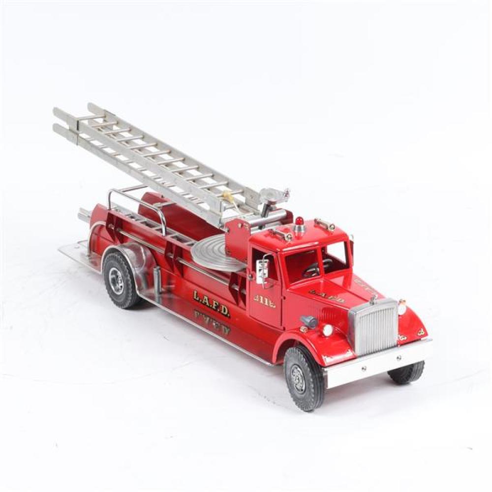 Appraisal: SMITH MILLER MACK RED PRESSED STEEL LAFD LADDER FIRETRUCK TOY