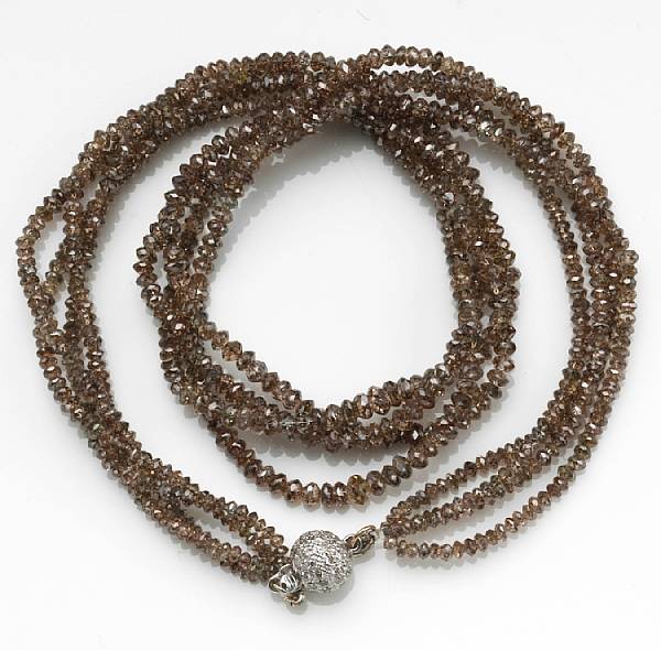 Appraisal: A brown diamond diamond and k white gold necklace estimated