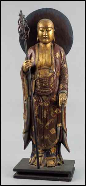 Appraisal: PARCEL GILT AND PAINTED WOOD FIGURE OF A DEITY Height