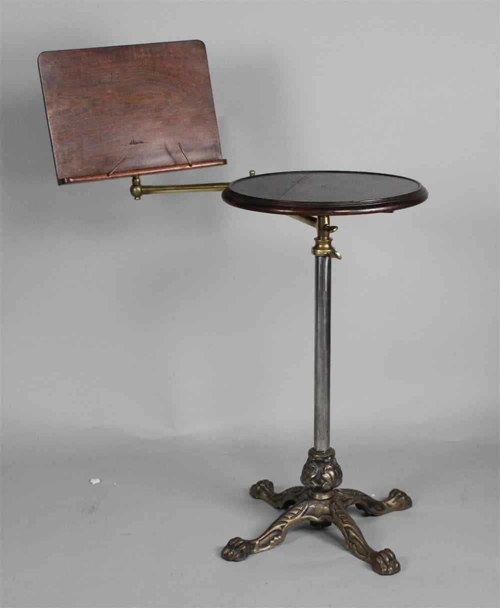 Appraisal: BRITISH READING STAND AND TEA TABLE the cast decorated metal