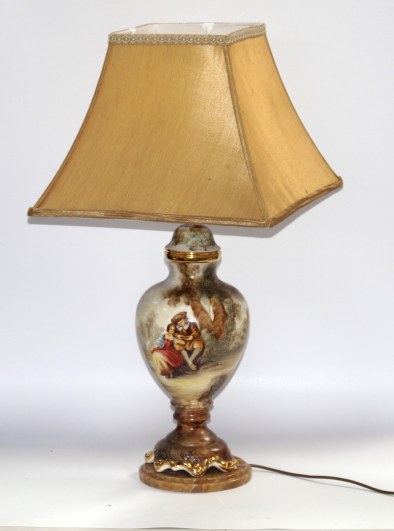 Appraisal: A thC Continental ceramic table lamp printed with two figures