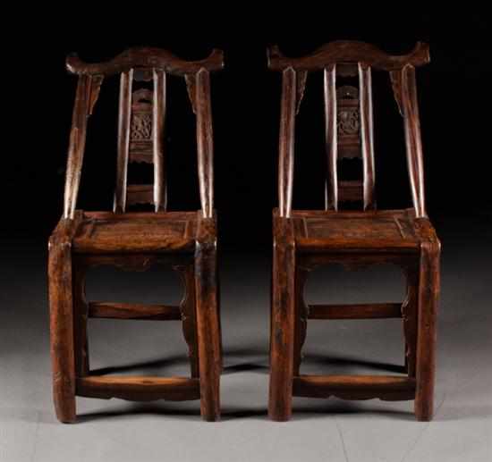 Appraisal: Pair of Chinese carved elmwood chairs pagoda shaped crest rail