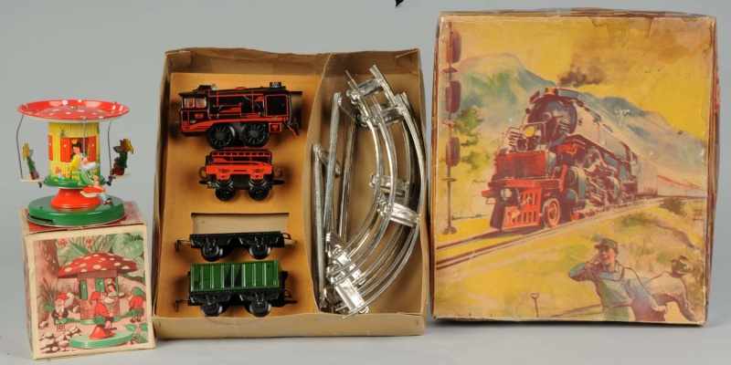 Appraisal: Lot of Tin Go-Around Train Set Toys Description German Both