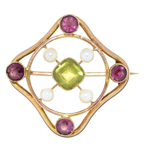 Appraisal: An Edwardian peridot paste and cultured pearl openwork brooch in