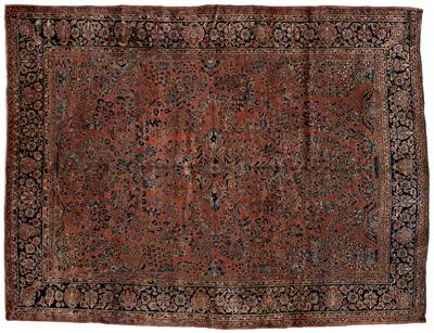 Appraisal: Sarouk rug repeating floral designs on faded burgundy field early