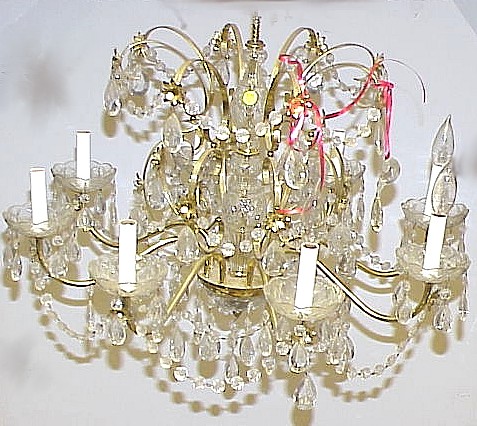 Appraisal: Eight arm chandelier with glass standard and tear drop prisms