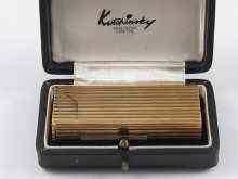 Appraisal: A ct gold petrol lighter by Kutchinsky hallmarked London Approx