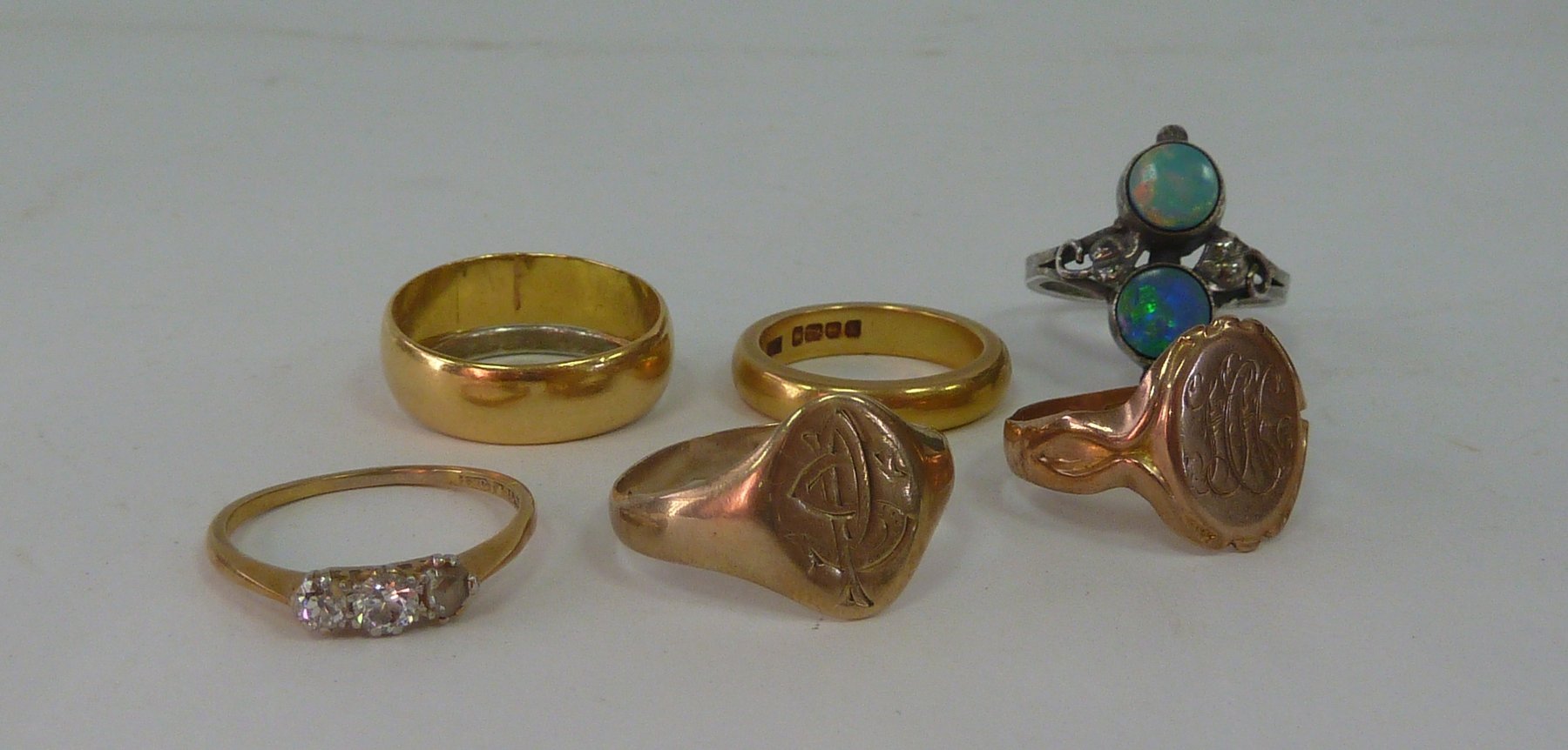 Appraisal: Two ct gold wedding bands two gold signet rings a