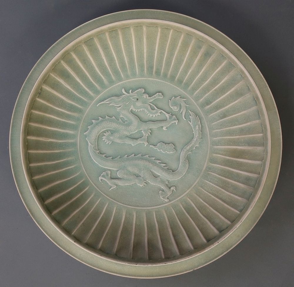 Appraisal: Asian Green Celadon Plate with Dragon Motif Asian green celadon