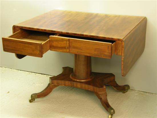 Appraisal: th century mahogany and cross banded sofa table th century