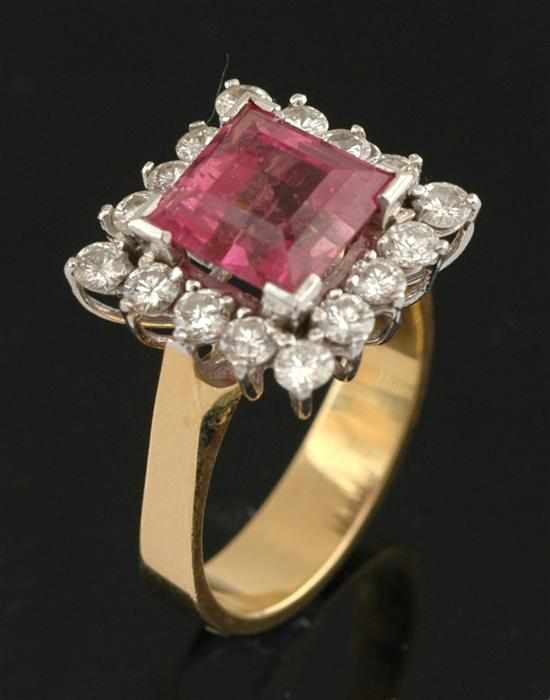 Appraisal: A tourmaline and diamond cluster ring Centrally set with a