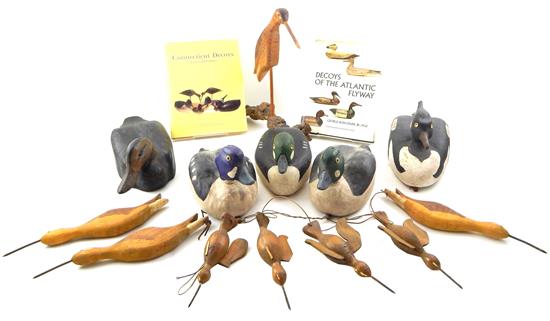 Appraisal: DECOYS Seven hand carved decoys and two books five Jim