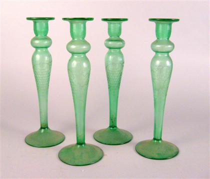 Appraisal: A set of four green glass candlesticks early th century