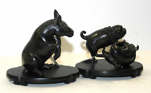 Appraisal: Two patinated bronze animal figurines Meiji Taisho Period The first