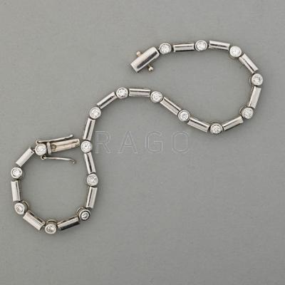 Appraisal: DIAMOND AND PLATINUM LINK BRACELET ca Seventeen circular brilliant cut