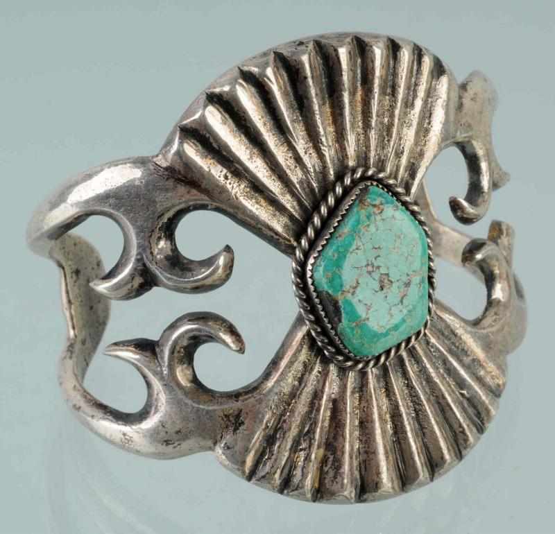 Appraisal: Native American Indian Coin Silver Cast Bracelet Description With turquoise