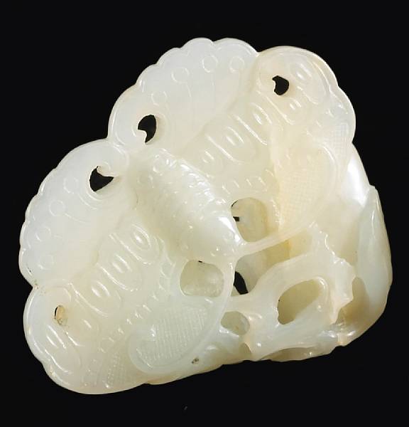 Appraisal: A small white jade toggle th Century Of irregular contour