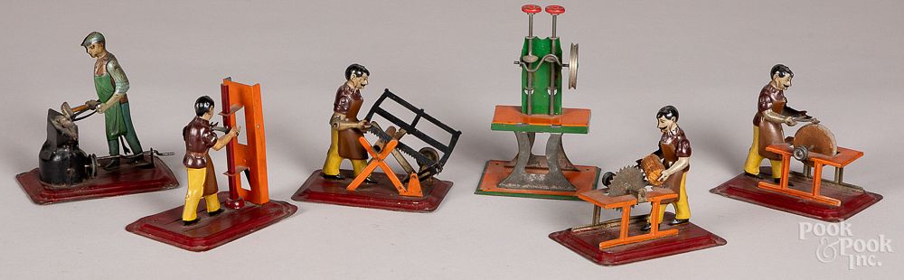 Appraisal: Five German painted tin steam toys Five German painted tin