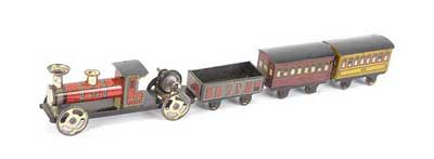 Appraisal: Carette c Pennytoy style Train Set consisting of tinplate -wheeled