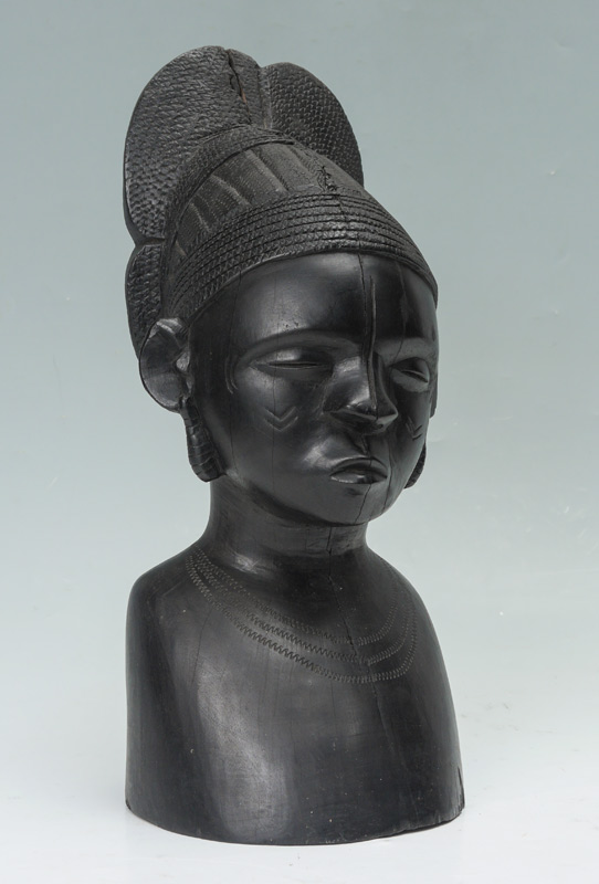 Appraisal: CARVED AFRICAN EBONY WOOD BUST Carved figure of a female