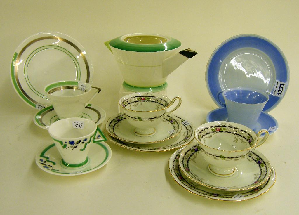 Appraisal: Shelley trios comprising a Mode coffee cup and saucer pattern