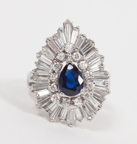 Appraisal: Lady's white gold diamond and sapphire ring centering a pear-shaped