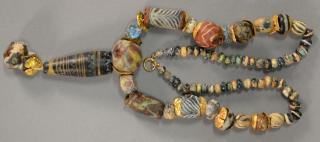 Appraisal: Ancient Roman or Egyptian beads with gold clasp and gold