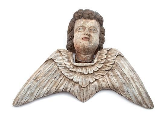 Appraisal: An Italian Painted Terracotta Winged Putti Head Height x width