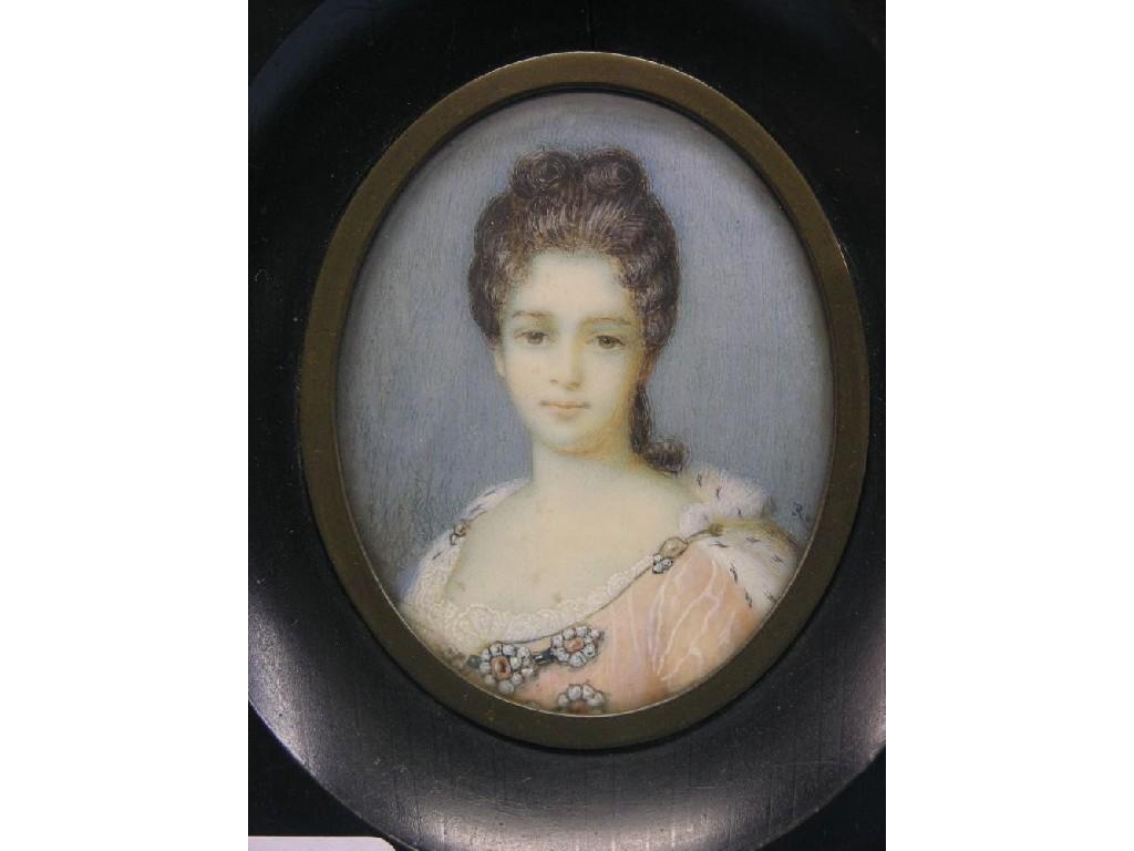 Appraisal: A Victorian miniature on ivory oval-shape portrait bust of a