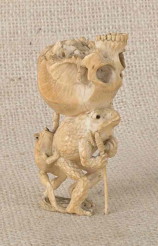 Appraisal: Carved ivory figure of a frog carrying a human skull