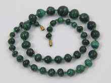 Appraisal: A graduated malachite bead necklace the beads between approx -