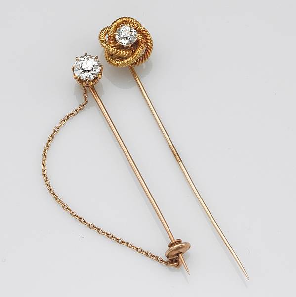 Appraisal: Two diamond k and k gold stick pins estimated total