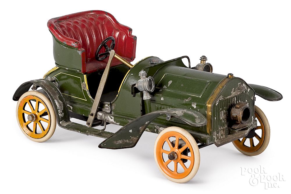 Appraisal: Bing clockwork two-seater open roadster Bing painted tin clockwork two-seater