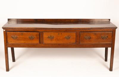 Appraisal: A George III oak dresser circa the oblong top above